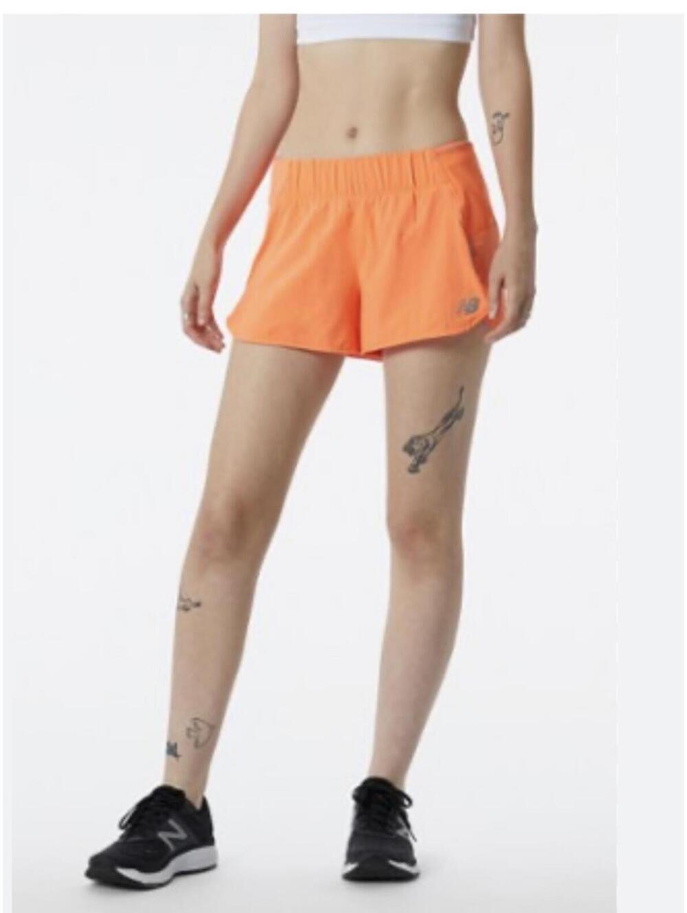 New Balance orange athletic shorts